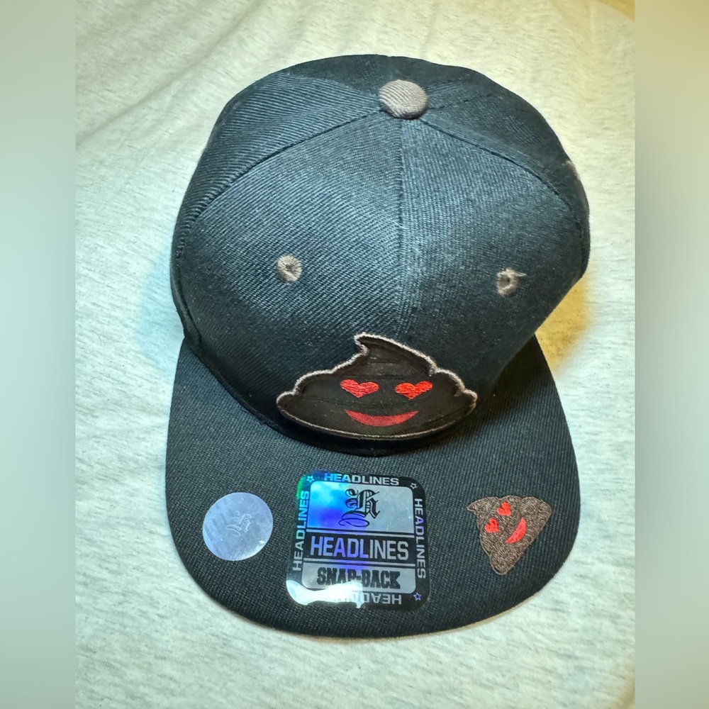 Kids black Headlines poop Emoji SnapBack hat